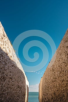 Empty Kingsgate Beach, walking through the chalk stacks clifs at Botany Bay in Kent, England