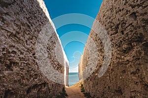 Empty Kingsgate Beach, walking through the chalk stacks clifs at Botany Bay in Kent, England