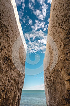 Empty Kingsgate Beach, walking through the chalk stacks clifs at Botany Bay in Kent, England