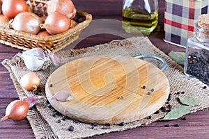 Empty kitchen board and spices