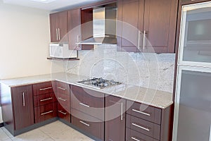 Empty kitchen in newly restored rebuilt house