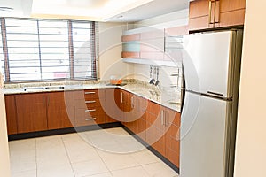 Empty kitchen in newly restored rebuilt house