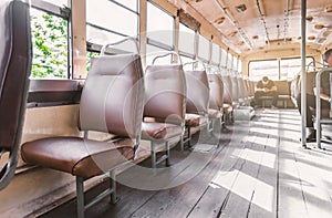 Empty leather seat inside the vintage auto bus of bangkok metropolis