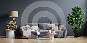 Empty living room interior with sofa on empty dark blue wall background