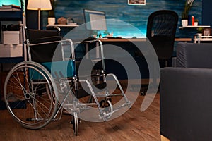 Empty living room with wheelchair and walking tools