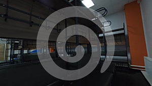 Empty locker room and open door to shower room in gym