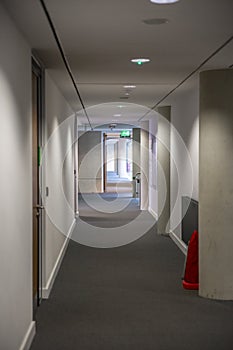 Empty long corridor in a modern office building