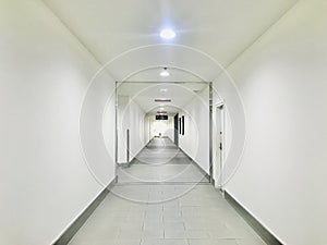 Empty long corridor to the Centre management.