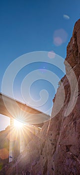 Empty long nevada mountain road to the horizon on a sunny summer day at bright sunset. vertical image for your reel and story