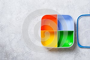 Empty lunch box with four sections for different food