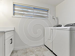 Empty luxury laundry room interior
