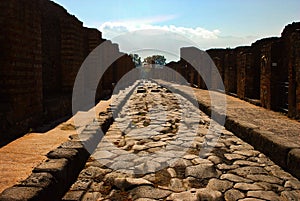 The empty main street in the Pompeii ruins city in Italy after Vesuv eruption