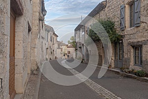 The empty main street of the small town of Lascabanes in Southwest France