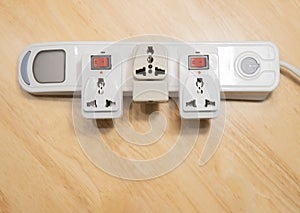 Empty many chargers port on maltiple electrical outlet over wooden background