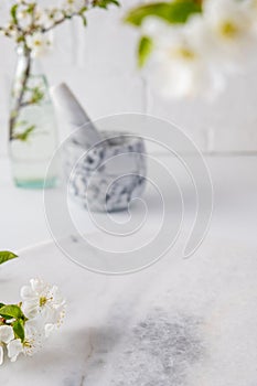 Empty marble board for product display with blurred bathroom interior background. Spa and body care