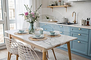 Empty marble dining table in Scandinavian kitchen