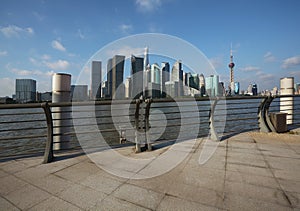 Empty marble road surface floor with Shanghai Skyline