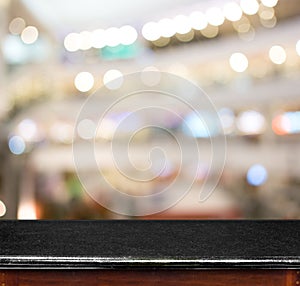 Empty marble table and blurred store in background. product display template