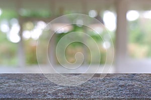 Empty marble table in front of abstract blurred Cafe, restaurant at night. For montage product display or design key visual layout