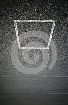 Empty marking square on car parking texture background