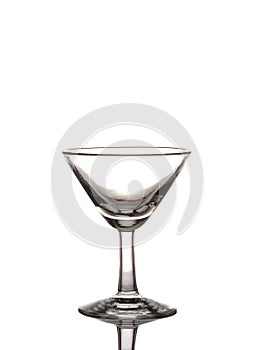 Empty martini glass isolated on white