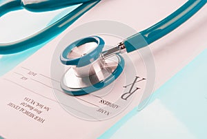 Empty medical prescription with stethoscope