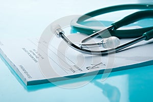 Empty medical prescription with a stethoscope photo