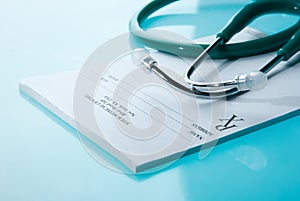 Empty medical prescription with a stethoscope