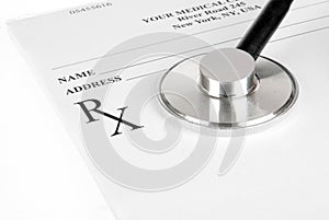 Empty medical prescription with a sthetoscope isolated