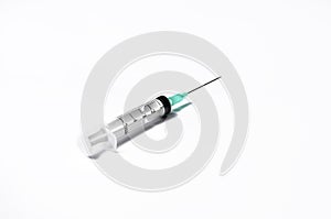Empty medical syringe closeup isolated on white background