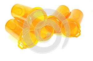 Empty medicine bottles isolated on white background.