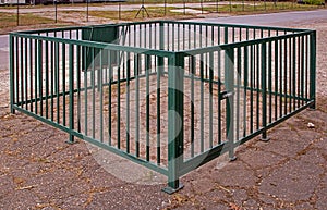 Empty metal cage on local rural farm