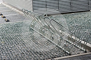 Empty metal parking rack for bicycles outdoors