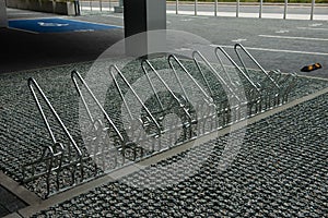 Empty metal parking rack for bicycles outdoors