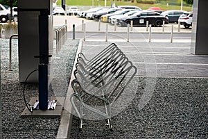 Empty metal parking rack for bicycles outdoors