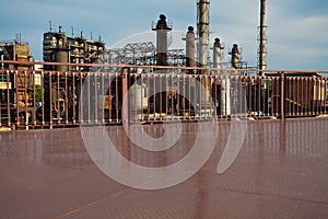 Empty metal road surface floor with old steel steelworks of pipe