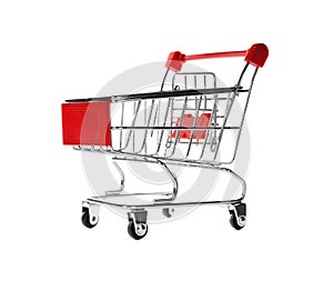 Empty metal shopping trolley isolated