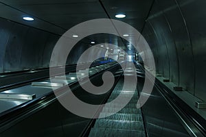 Empty metro escalator stairs.