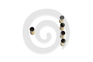 Empty 9mm bullet shells over white background standing