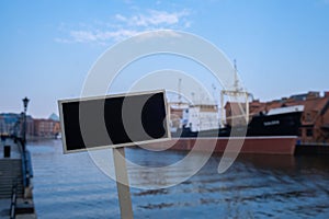 Empty mockup template Blackboard label against Soldek the first ship built in Poland after World War II to the Gdansk