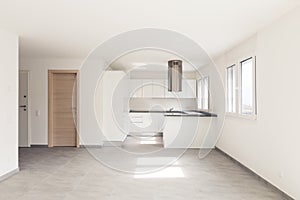 Empty modern apartment, empty spaces and white walls