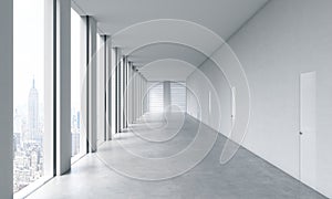 Empty modern bright clean interior of an open space office. Huge panoramic windows