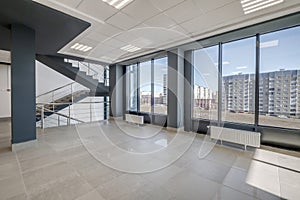 empty modern hall room with columns, doors and panoramic windows