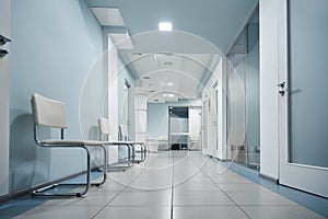 Empty modern hospital corridor, clinic hallway interior background. photo