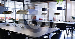 Empty, modern office and furniture in workplace or building for meeting, career and workspace. Business space, chair and
