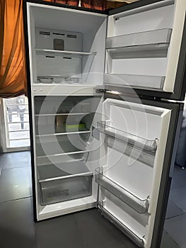 Empty Modern Refrigerator with Open Doors