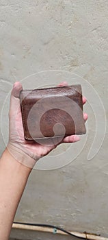The empty money in the leather wallet isolated by white background, currency and the bisnis