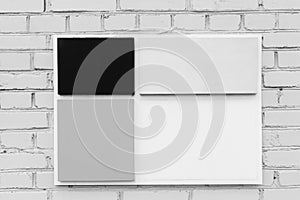 Empty monochrome squares abstract design blank grey cubes on white urban brick wall mock up background