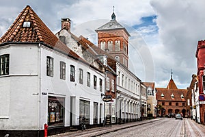 Empty morning street with old houses from royal town Ribe in Den