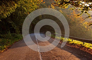 Empty mountain asphalt road. Beautiful autumn scene.